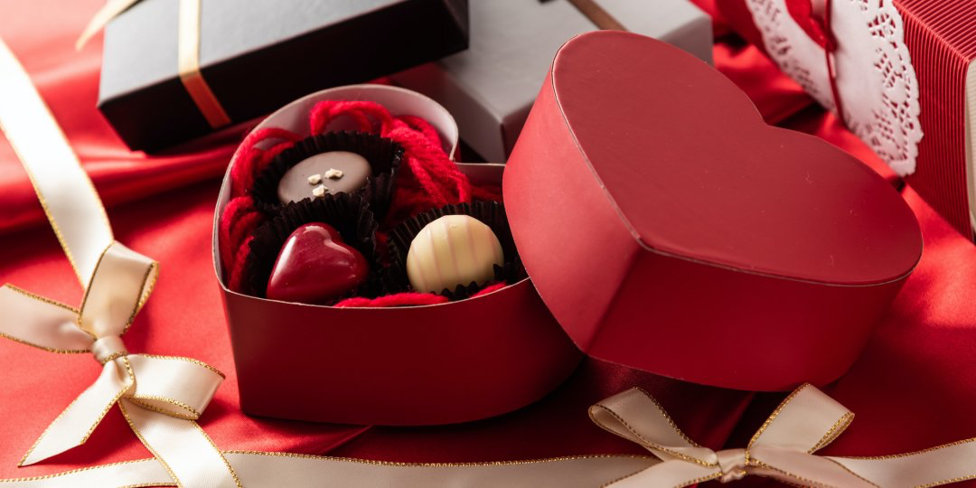a heart shaped red box of chocolates for Valentine’s day | Wedifys