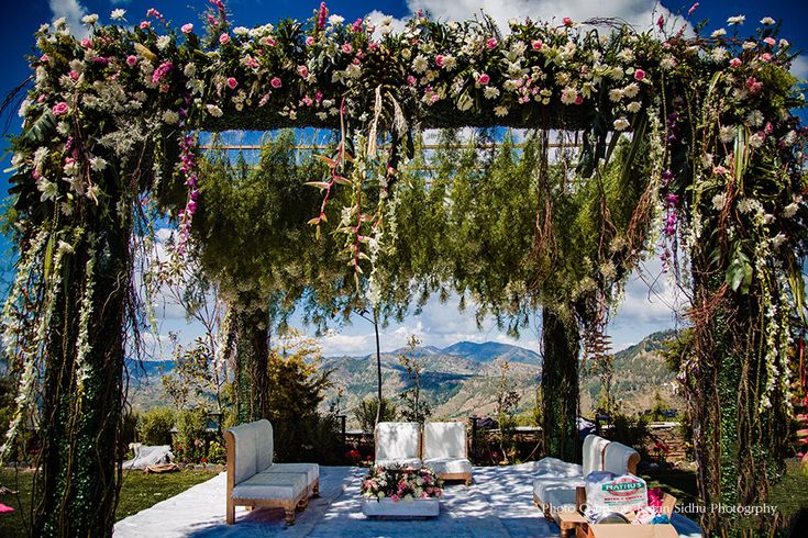 floral mandap setup in the mountains of a hill station | Wedifys