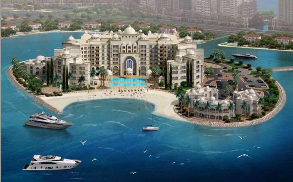 a picture of the Marsa Malaz Kempinski - The Pearl located on an island surrounded by water | Wedifys