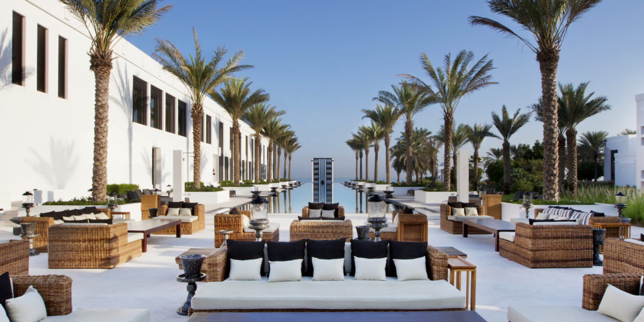 the sitting area besides the swimming pool of The Chedi in Muscat | Wedifys