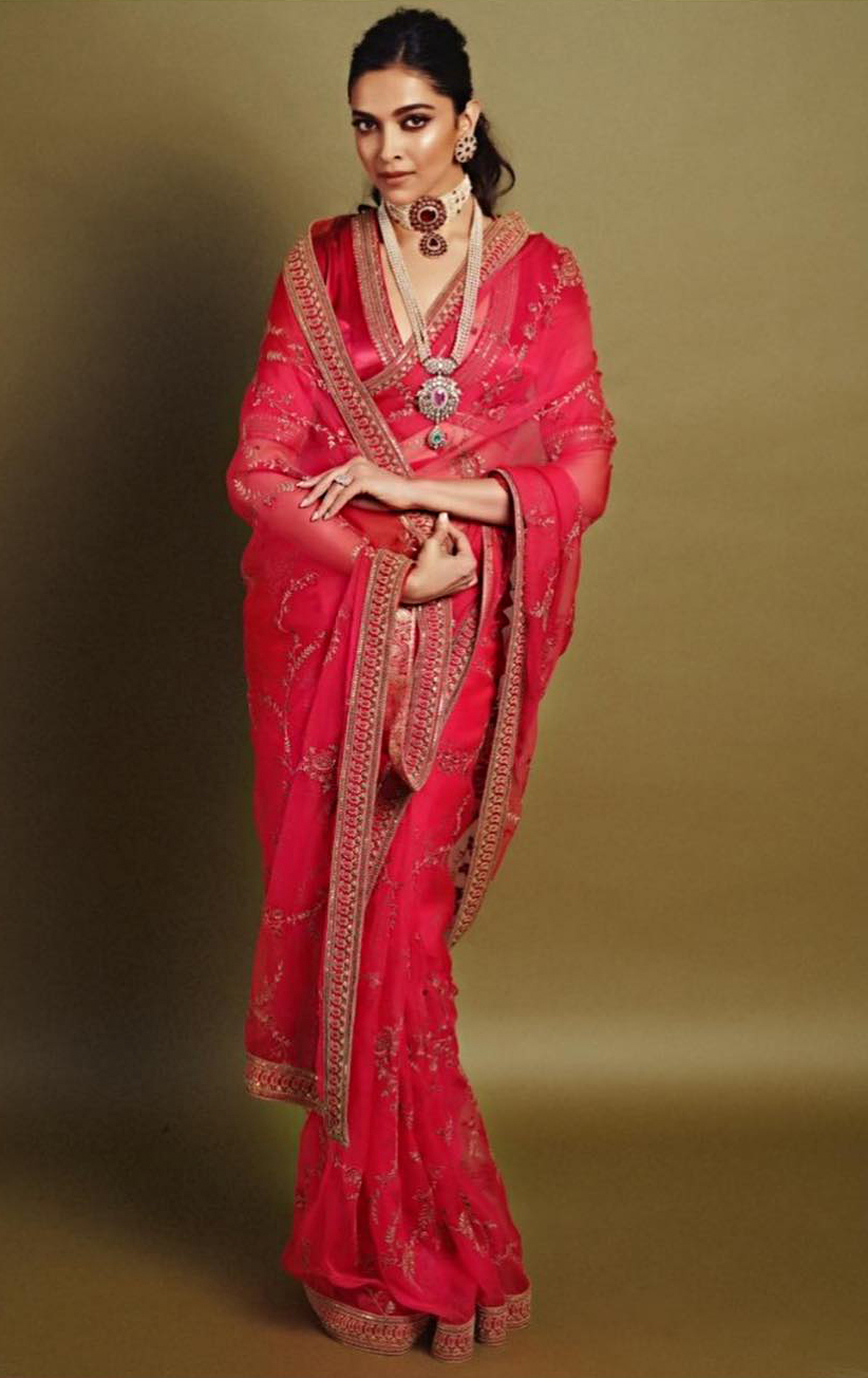 embroidered pink saree worn with rani necklace | Wedifys