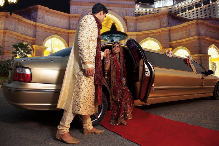 Indian bride and groom at the wedding venue in a limo | Wedifys