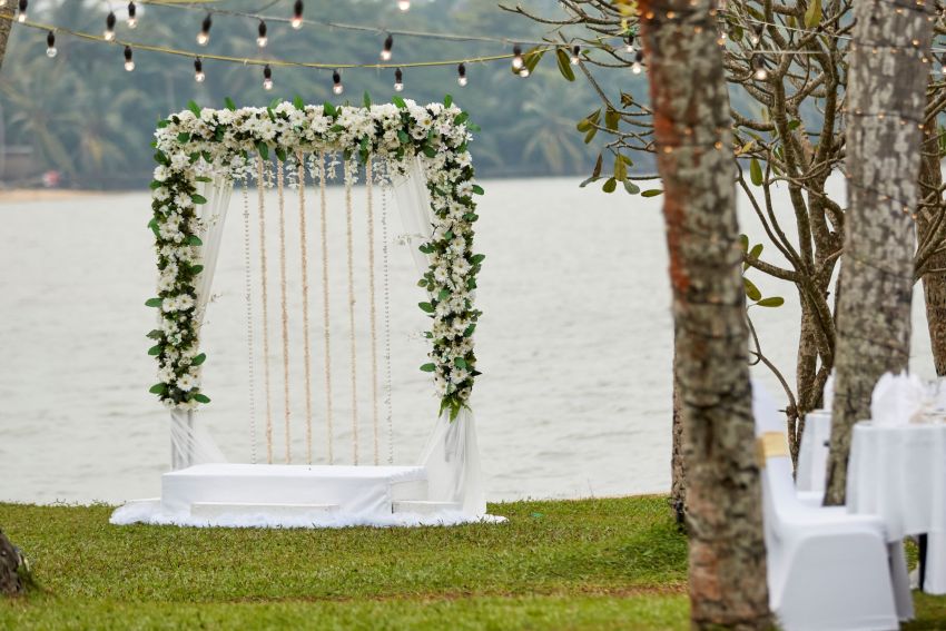 wedding backdrop by the sea for a daytime wedding at AVANI Kalutara Resort in Sri Lanka | Wedifys