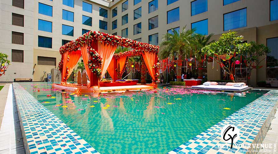 Indian wedding mandap set in the pool at Courtyard by Marriott Agra | Wedifys