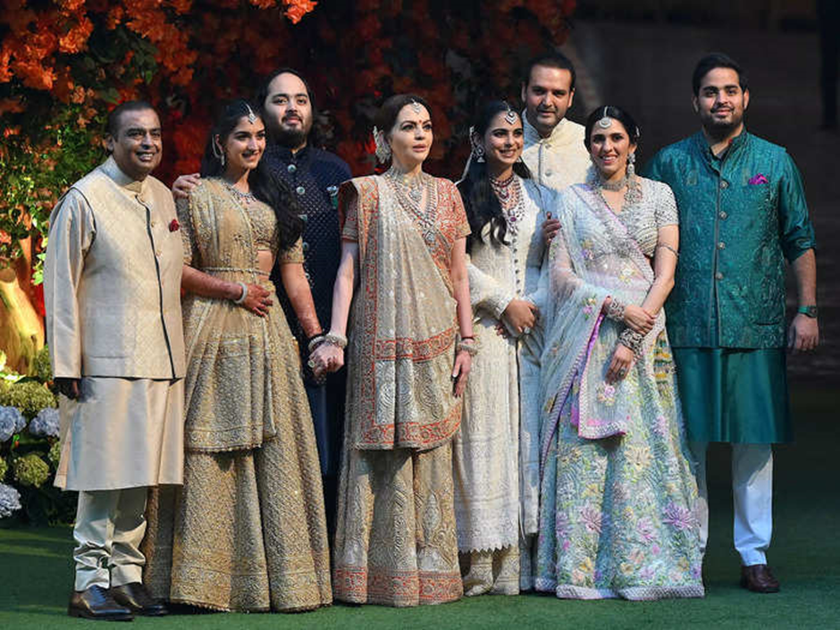 The Ambanis in traditional Indian clothes at Anant Ambani and Radhika Merchant's engagement ceremony in 2023.