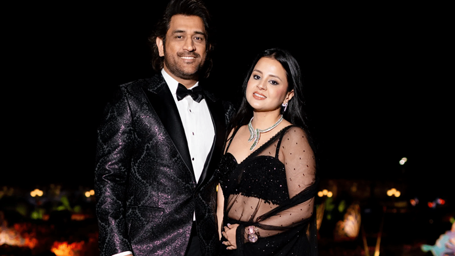 MS Dhoni and his wife Sakshi at Anant Ambani and Radhika Merchant’s pre-wedding bash. | Wedifys