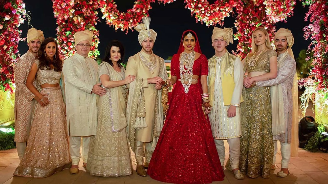 Nick Jonas and Priyanka Chopra with family at their wedding | Wedifys