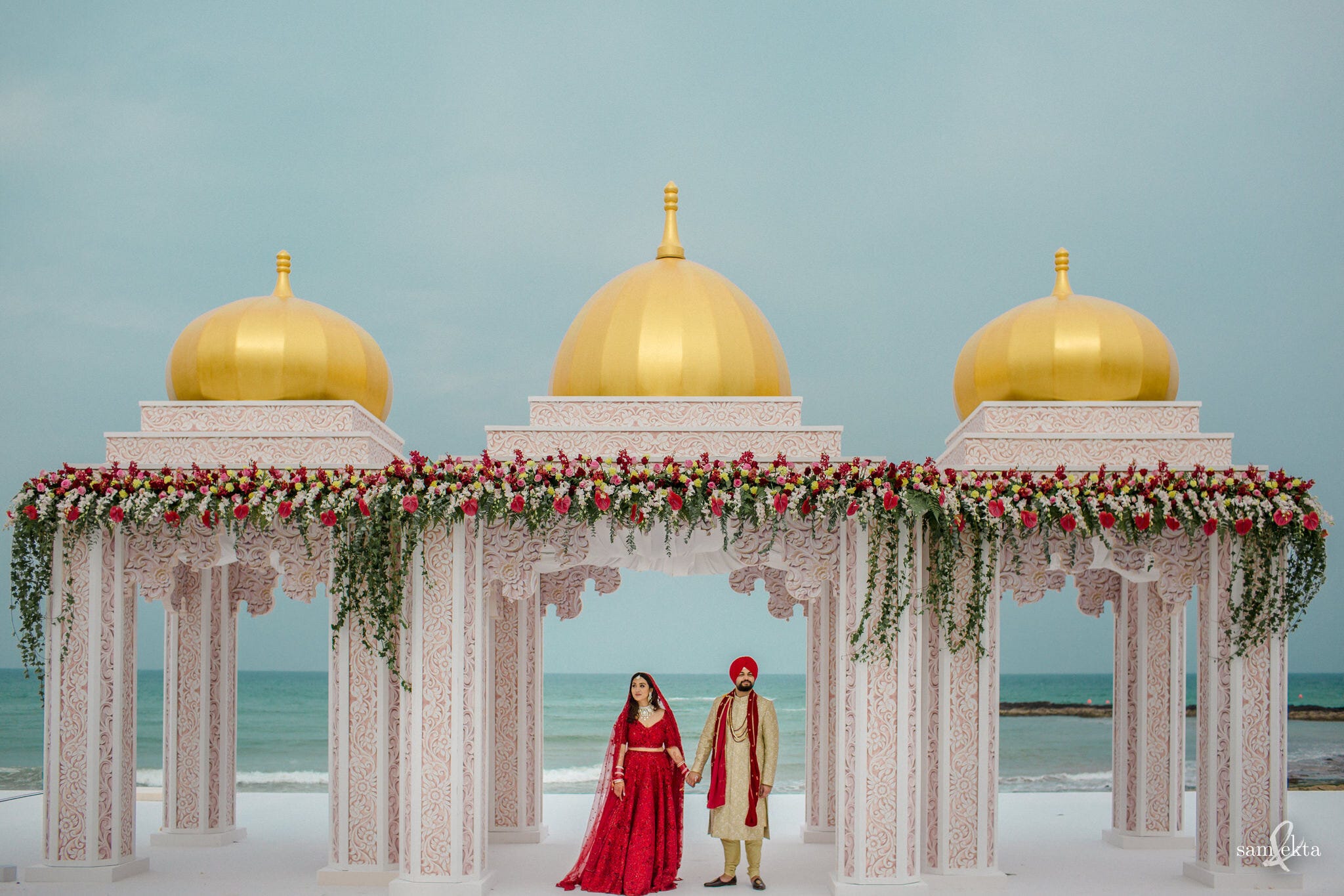 beach wedding at Al Bustan Palace in Muscat, Oman | Wedifys