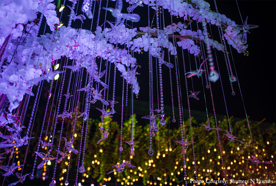 Apurva and Ankit’s wedding décor with majestic trees adorned with white orchids | Wedifys