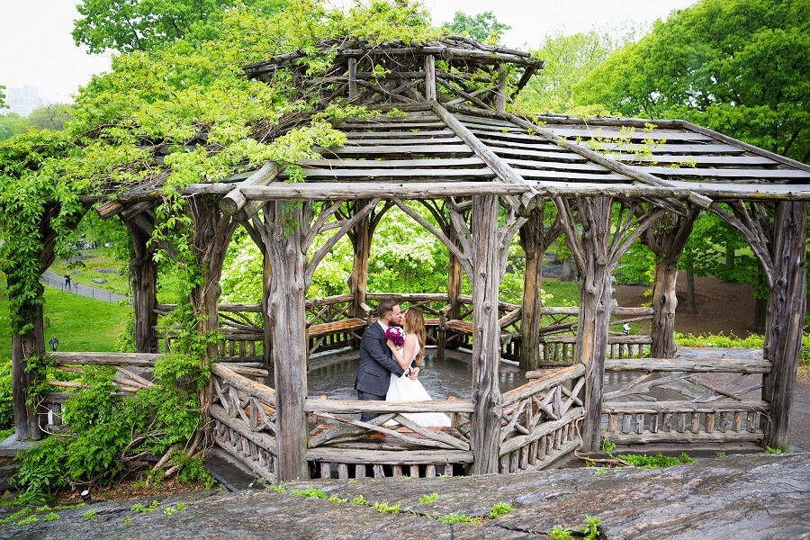 a couple celebrating their wedding at Dene Summerhouse in Central Park | Wedifys