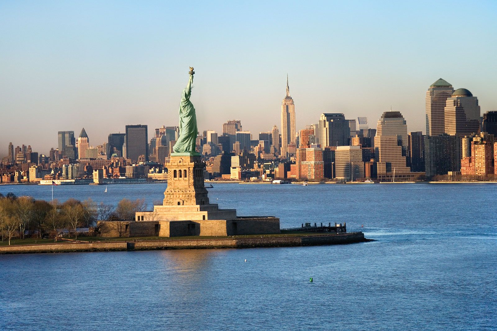 Aerial view of New York City with the famous Statue of Liberty | Wedifys