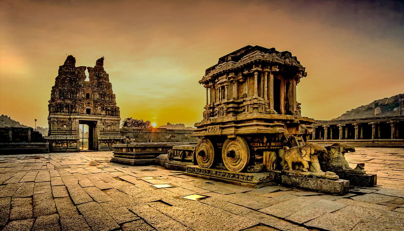 sunset view of the ancient ruins of Hampi | Wedifys