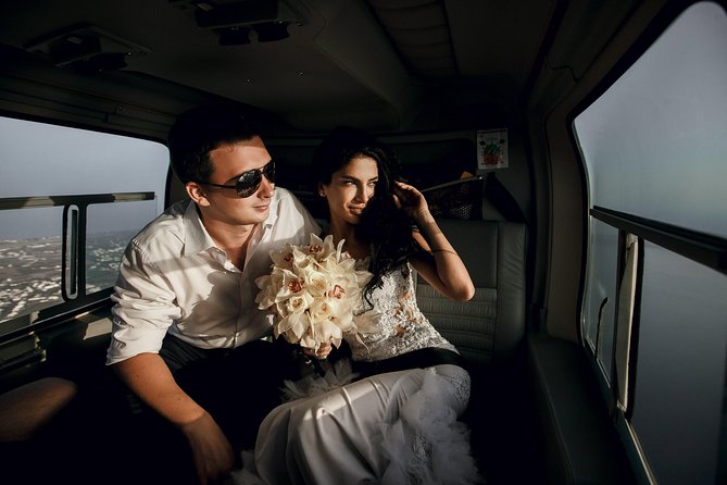 a couple enjoying a helicopter ride in San Bartolome de Tirajana, Spain | Wedifys