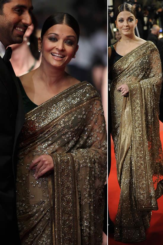 Aishwarya in her Sabyasachi saree along with Abhishek Bachchan at the Cannes Film Festival | Wedifys