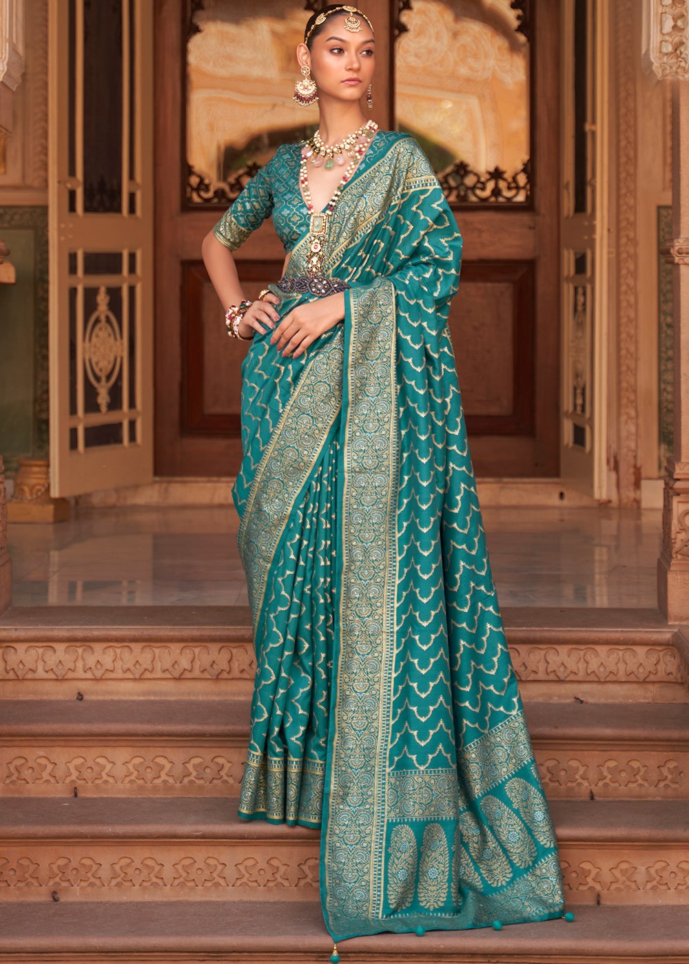 a woman in a green banarsi saree | Wedifys