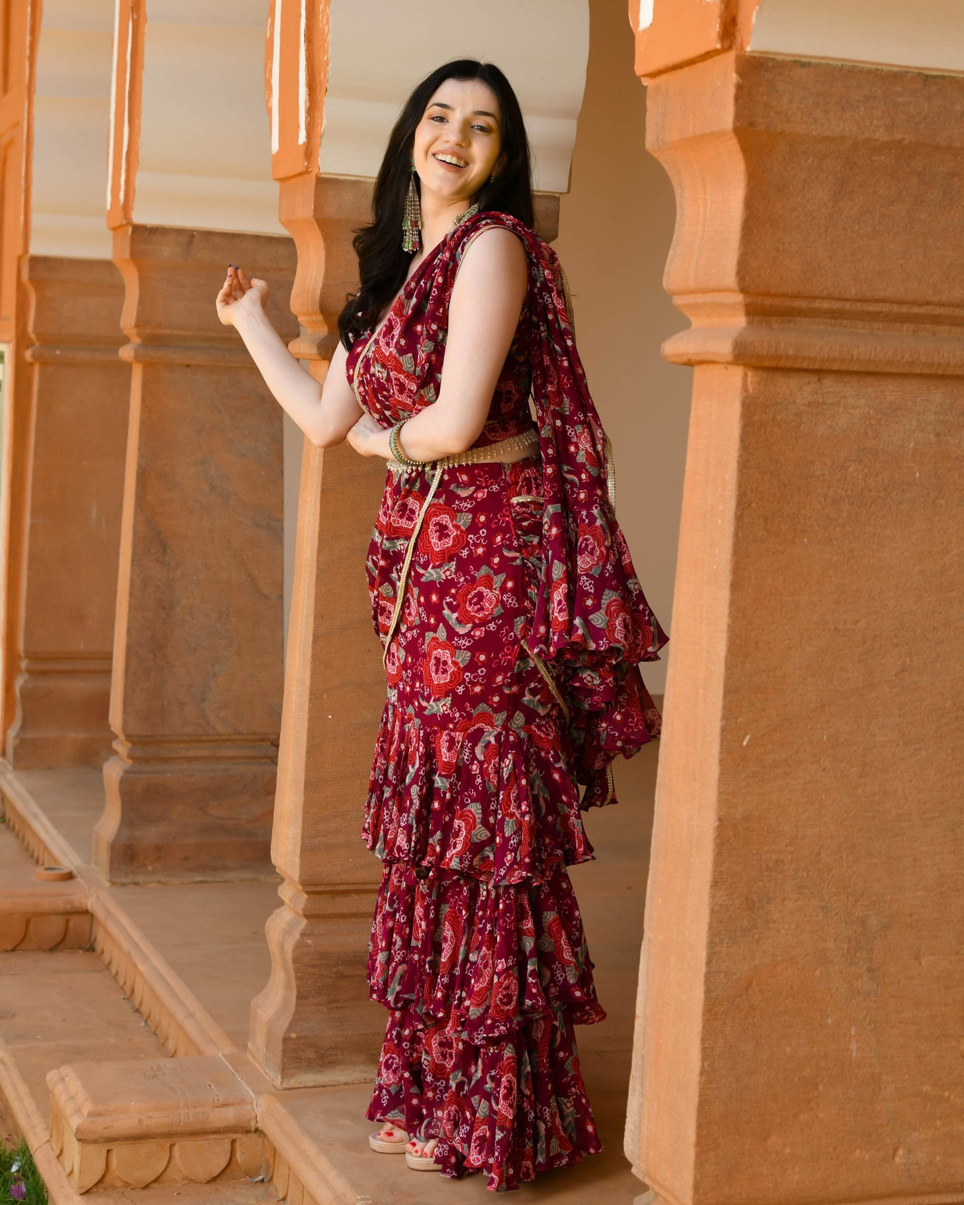 a woman in beautiful pre-draped saree | Wedifys