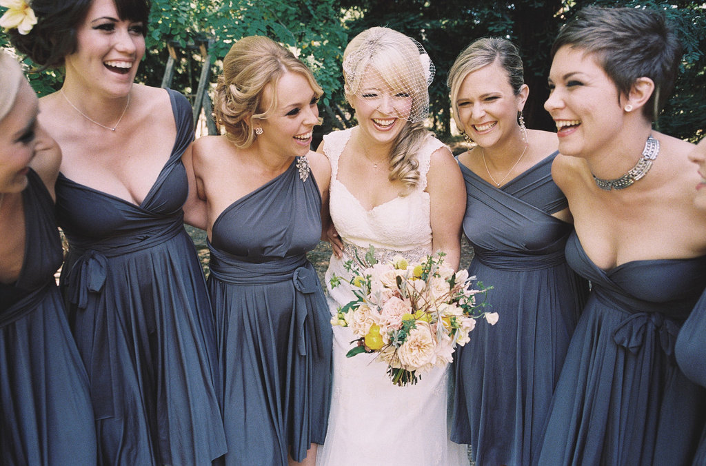 bridesmaids wearing convertible dresses whereas bride wearing a white dress | Wedifys