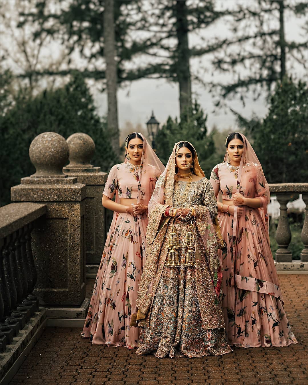 Indian bridesmaids with matching sarees with the bride | Wedifys