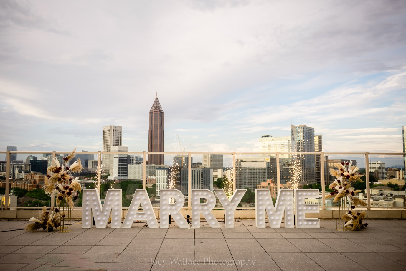 décor for a proposal on the rooftop of Ventanas in Atlanta, Georgia | Wedifys