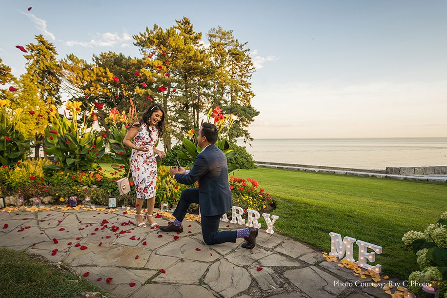 Dhruv proposing Anmol at a botanical garden in Oakville, Ontario | Wedifys