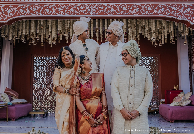 Vikram and Rhea in their wedding photoshoot with their family | Wedifys