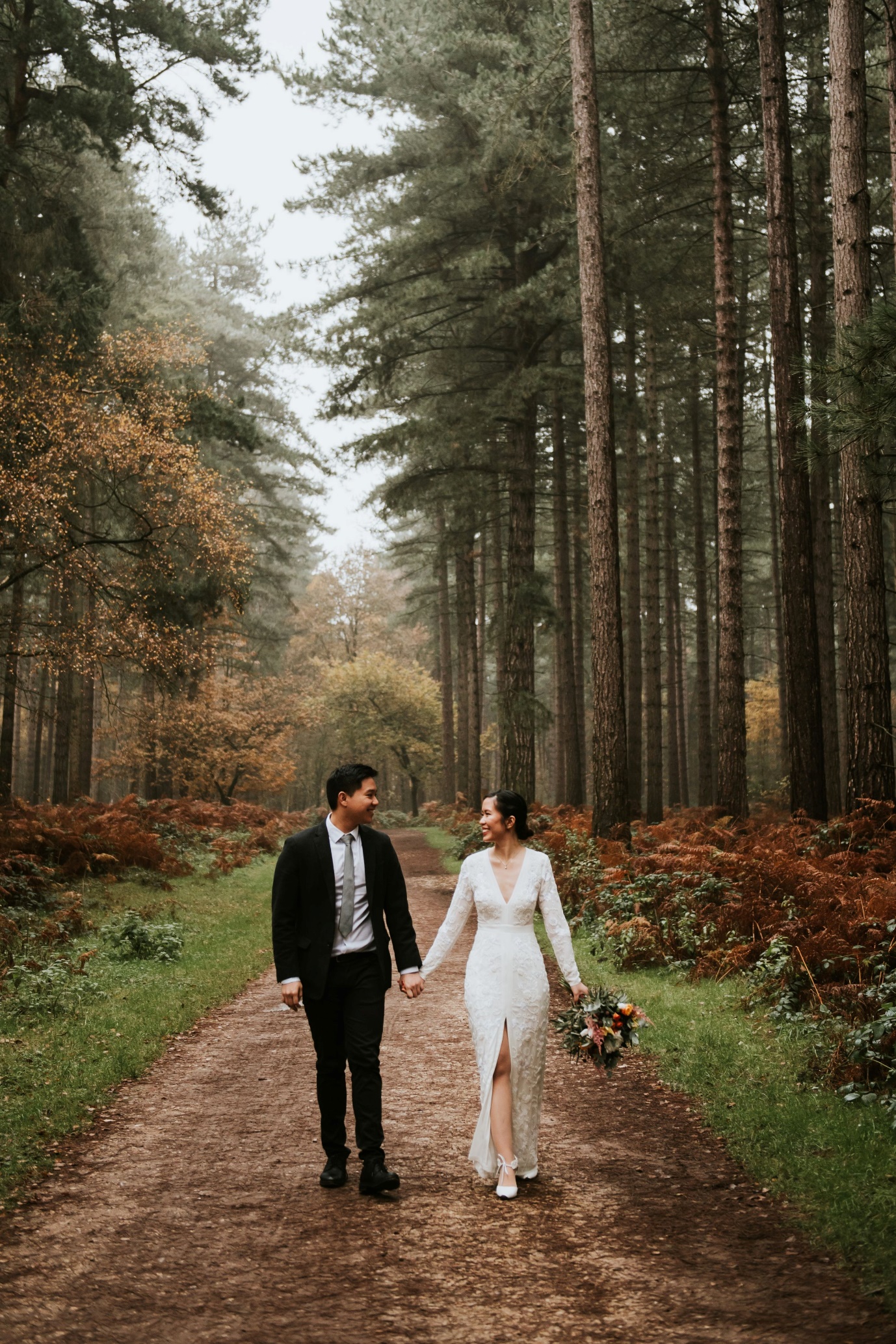 a couple in a forest for their pre-wedding photoshoot | Wedifys