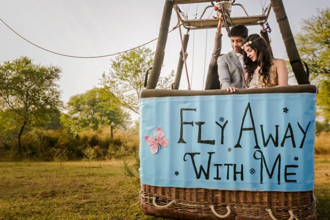Arpita and her fiancé getting in the hot-air balloon for their pre-wedding photoshoot | Wedifys