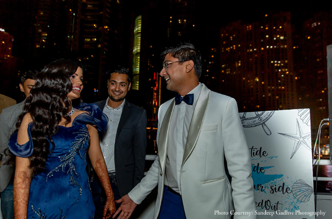 Aneri and Kashyap in their photoshoot at the yacht party at Marina Bay in Dubai | Wedifys