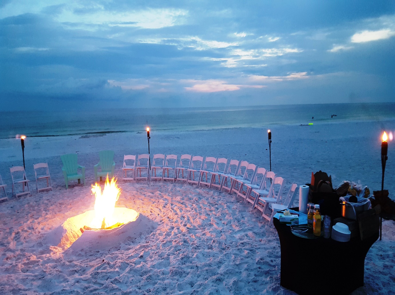 décor for a beachside bonfire and an engagement party | Wedifys