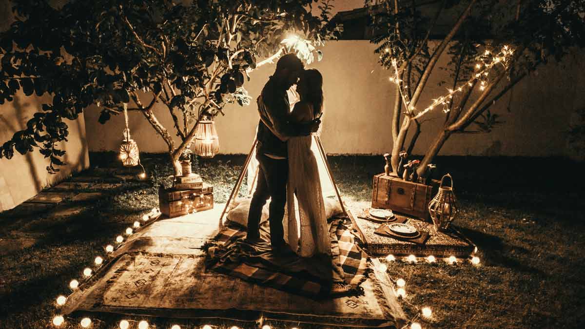 a couple in their pre-wedding photoshoot in a backyard | Wedifys