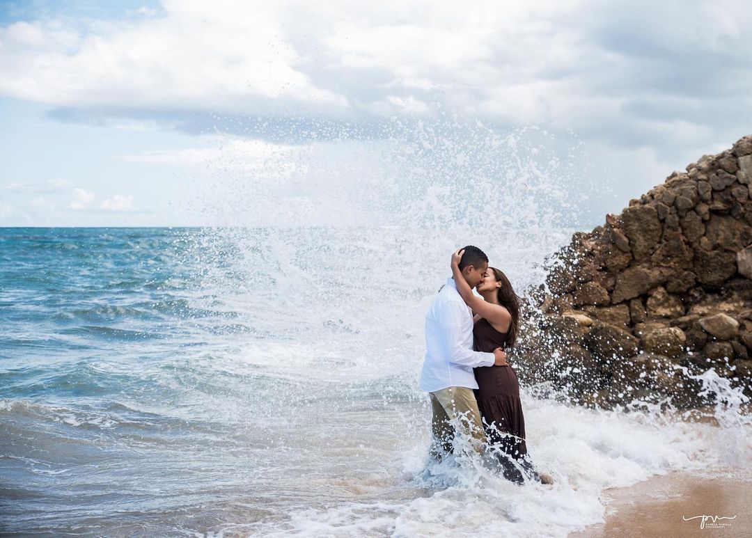 a couple in their pre-wedding shoot by the beach | Wedifys