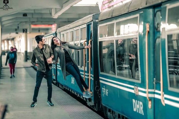 a couple in their pre-wedding shoot at a railway station | Wedifys