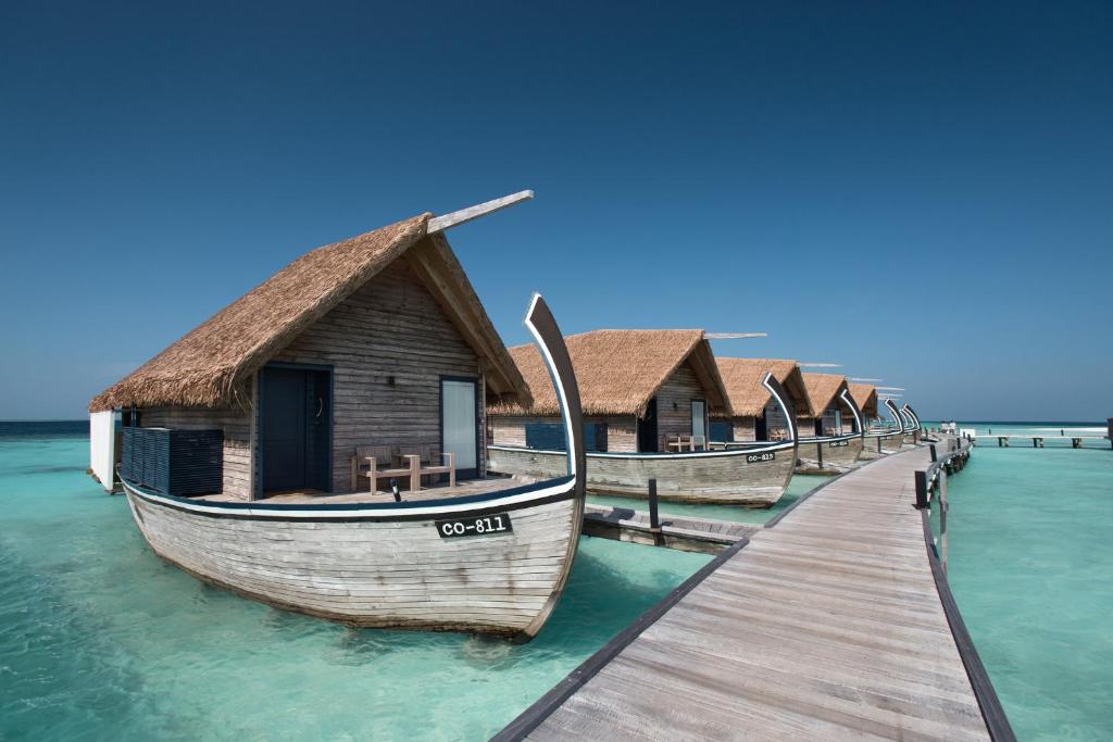 boat-styled huts of the COMO Cocoa Island in Maldives | Wedifys